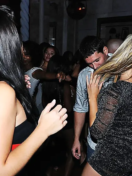 Nikki Delano and Casi James strip for the camera and share a big