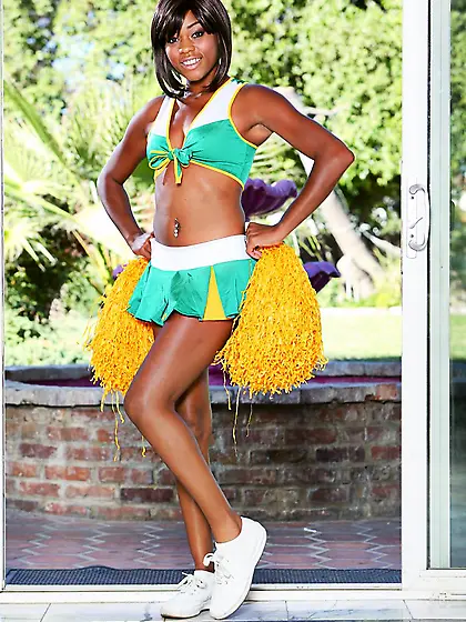 Naughty Karma May entertains in cheerleader uniform and plays wi