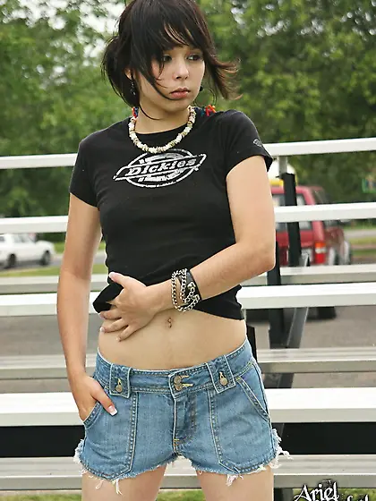 Hot brunette Ariel Rebel posing outdoors and shows her beautiful