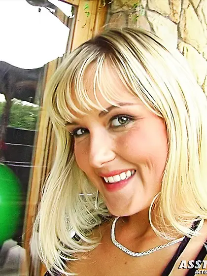 Blonde babe dons black