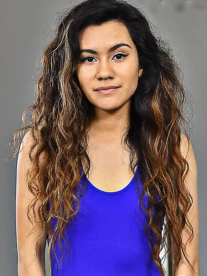 Babe in a blue dress loves her viewers and presents her naked bo