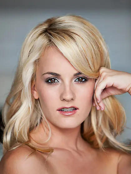 Blond dildo fucks twat with black toy