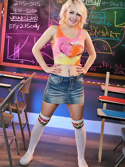 Young blondie in high-knee socks gets fucked in the classroom