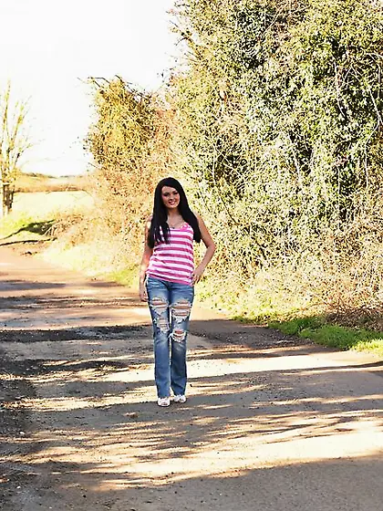 Posh hottie takes off ripped jeans and polka dot lingerie to sho