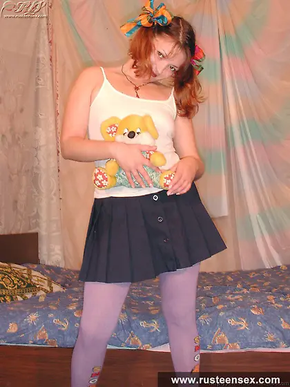 Russian teen dildoing and fingering herself