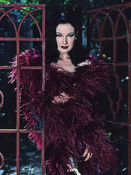 The delicious Dita Von Teese takes it all off in the garden for