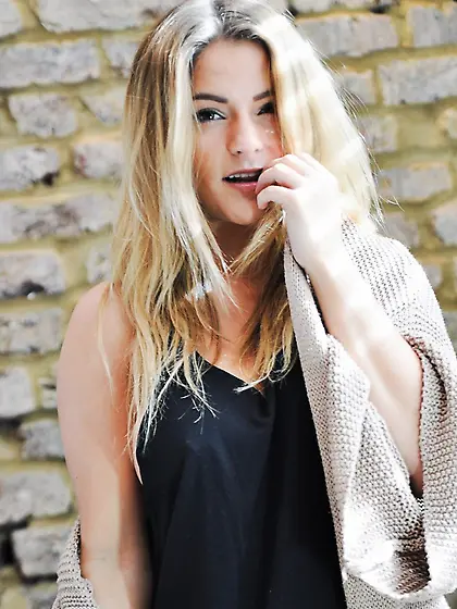 Adorable blond lassie doffs clothes to flaunt her big boobs and