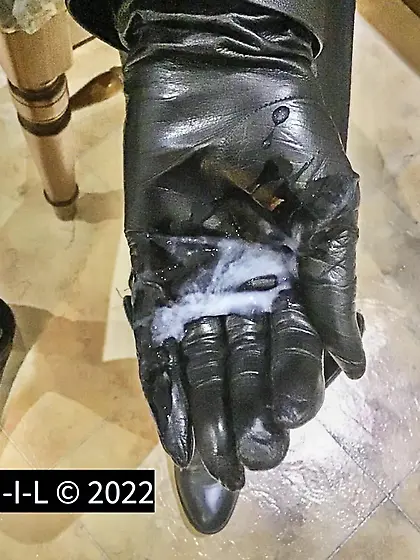 Nicola in leather cummy gloves