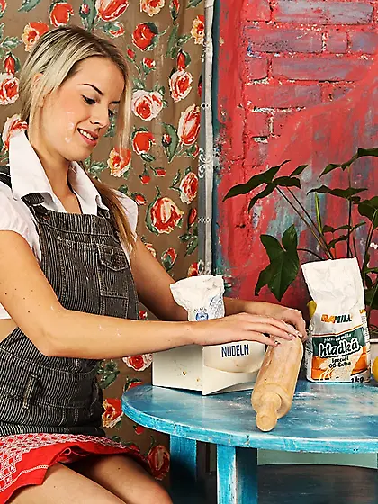 Fair-haired Petra Gopik gives a smile before she bares her juicy