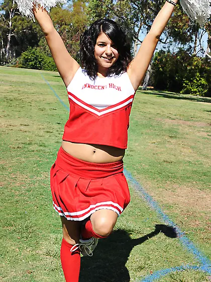Curvy dark haired cheerleader
