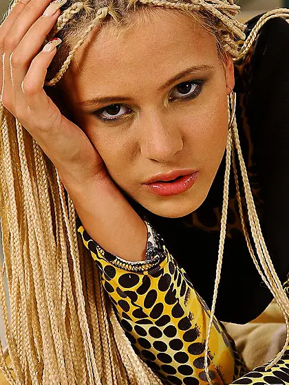 Flat chested leggy dreadlock girl Cora Carina removes her boots