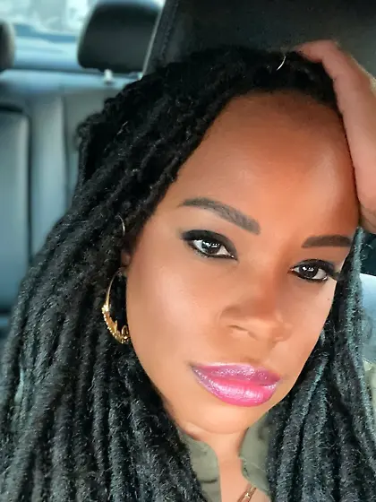 Shalanda tried to hide her face while flashing