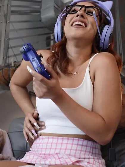 Busty gamer chick Kira Perez pleases black dude on the couch