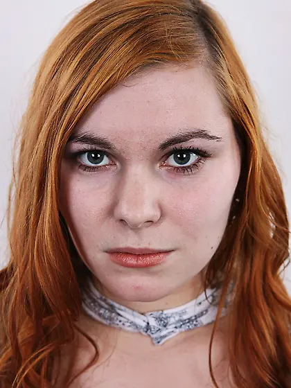 Young lusty rounded redhead