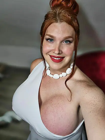 Busty Redhead Bimbo