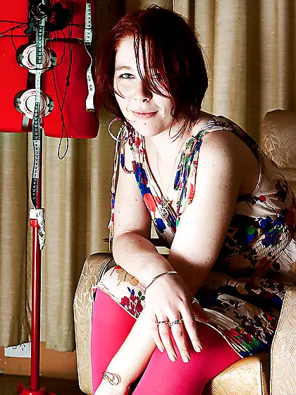 Redheaded girl with a pale body wants to show her crotch