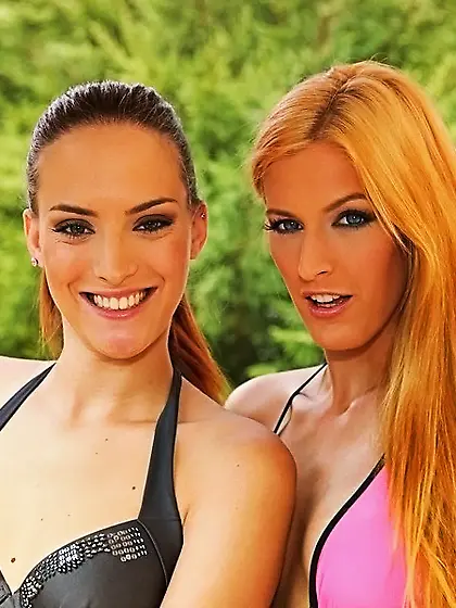 Long-haired blonde and her slender friend fool around naked in f