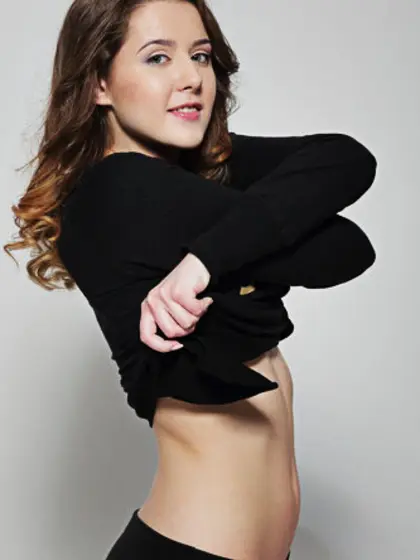 Lovable teen hottie slowly takes off clothes to pose naked for e