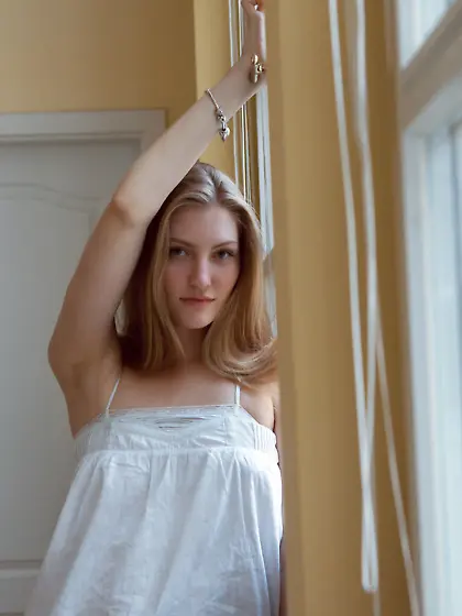 Blond-haired beauty in white demonstrates her eager love hole Vi