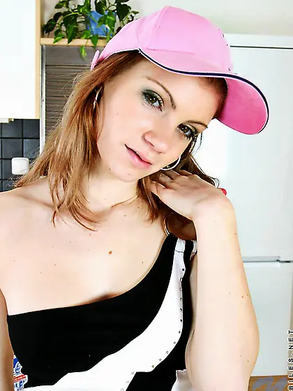 Tasty chick Ally Nubiles in pink cap draws off her cute panties