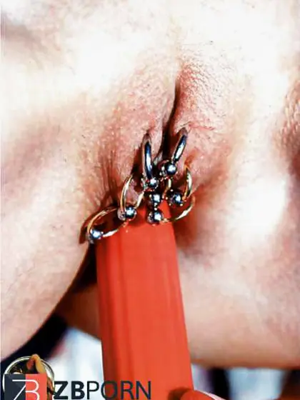 Dark-Haired MUMMY pridefully demonstrating off her piercings