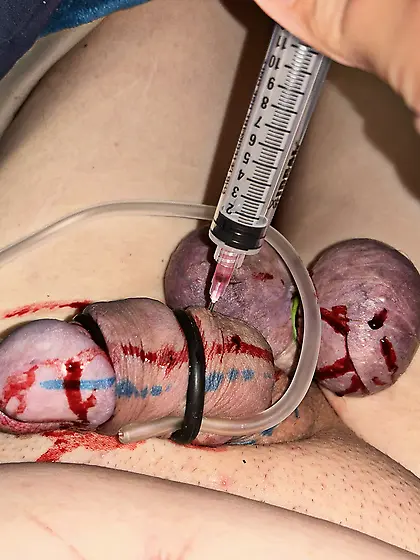 My cock and balls being prepared for cutting away