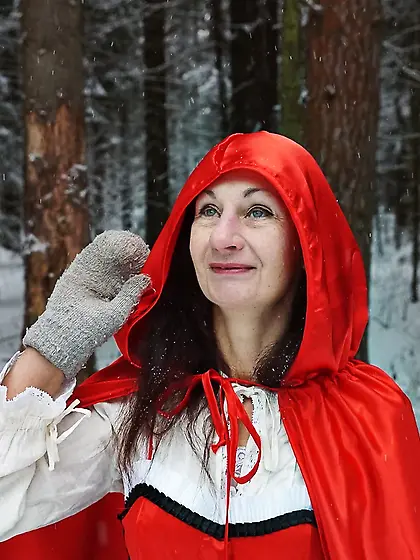 Little Red Riding Hood on a forest path